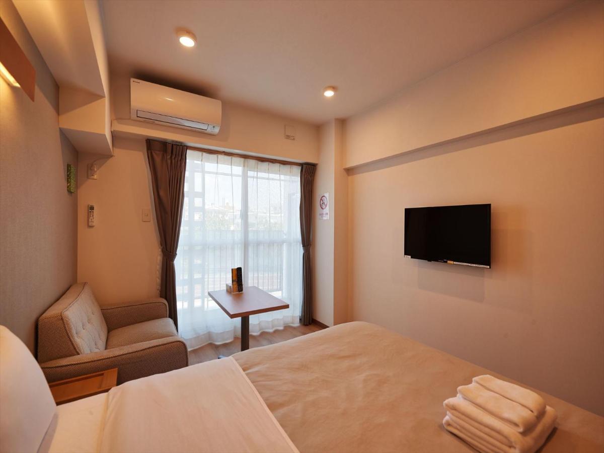 Aparthotel アルセ琉球ハーバーステイ Urasoe Exterior foto