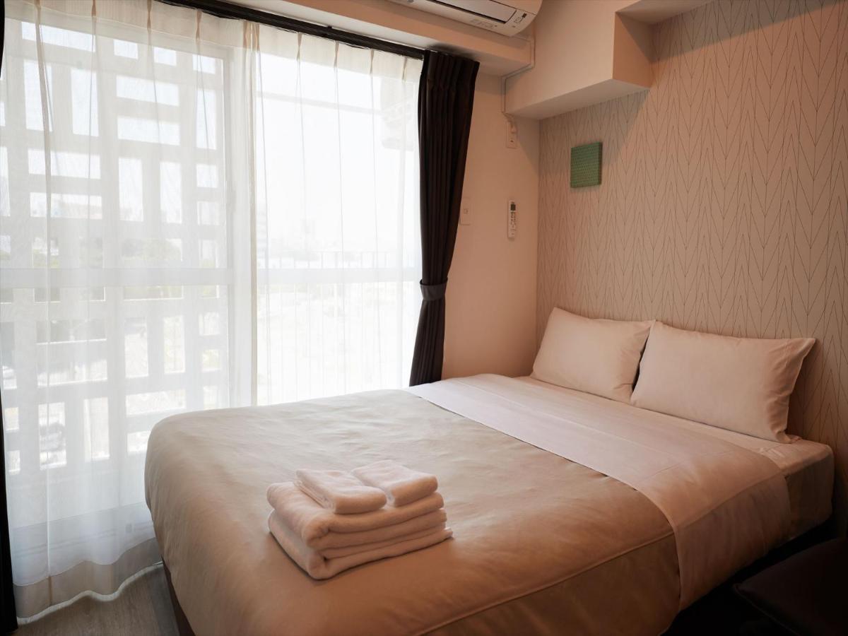 Aparthotel アルセ琉球ハーバーステイ Urasoe Exterior foto